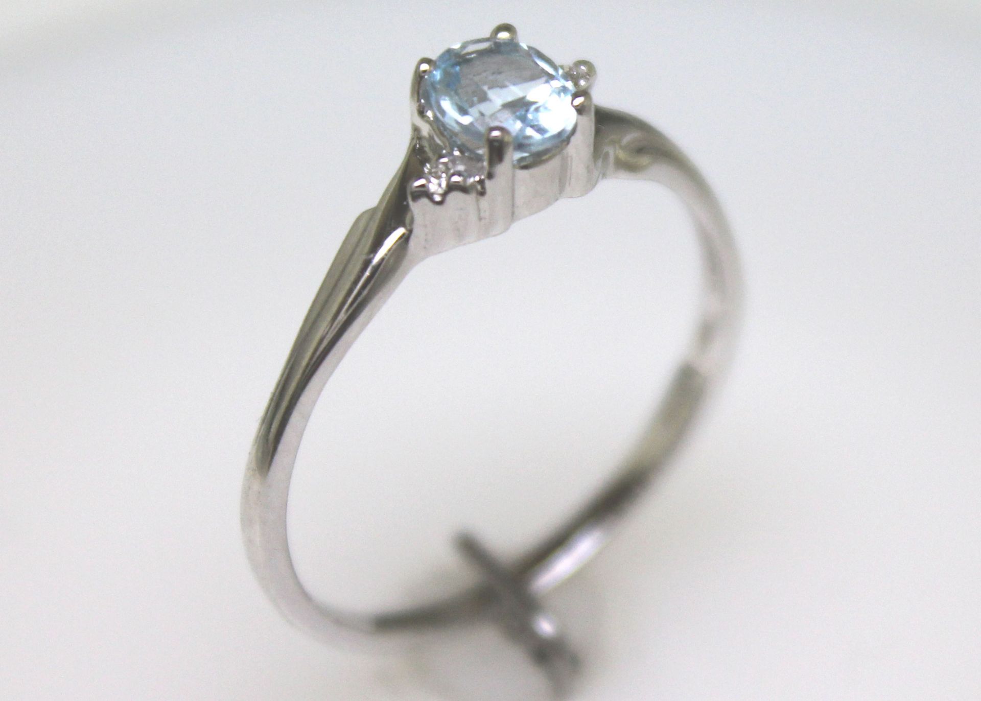 9ct White Gold Diamond and Blue Topaz Ring 0.01 Carats - Valued by GIE £755.00 - This ring - Image 8 of 9