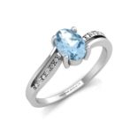 9ct White Gold Diamond And Blue Topaz Ring 0.02 Carats - Valued by GIE £1,070.00 - An oval shaped