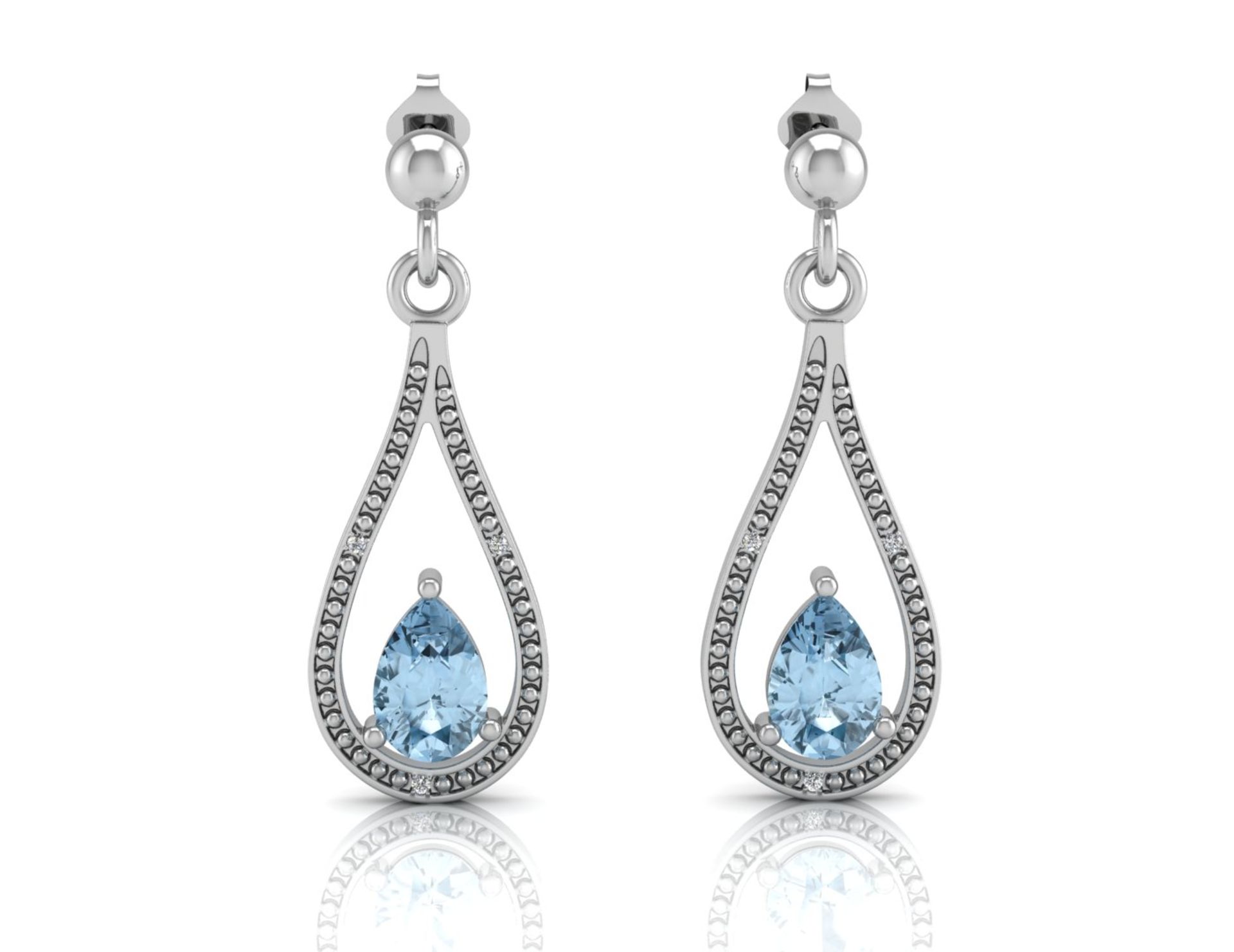 9ct White Gold Diamond And Blue Topaz Earring 0.02 Carats - Valued by AGI £468.00 - 9ct White Gold - Image 3 of 3