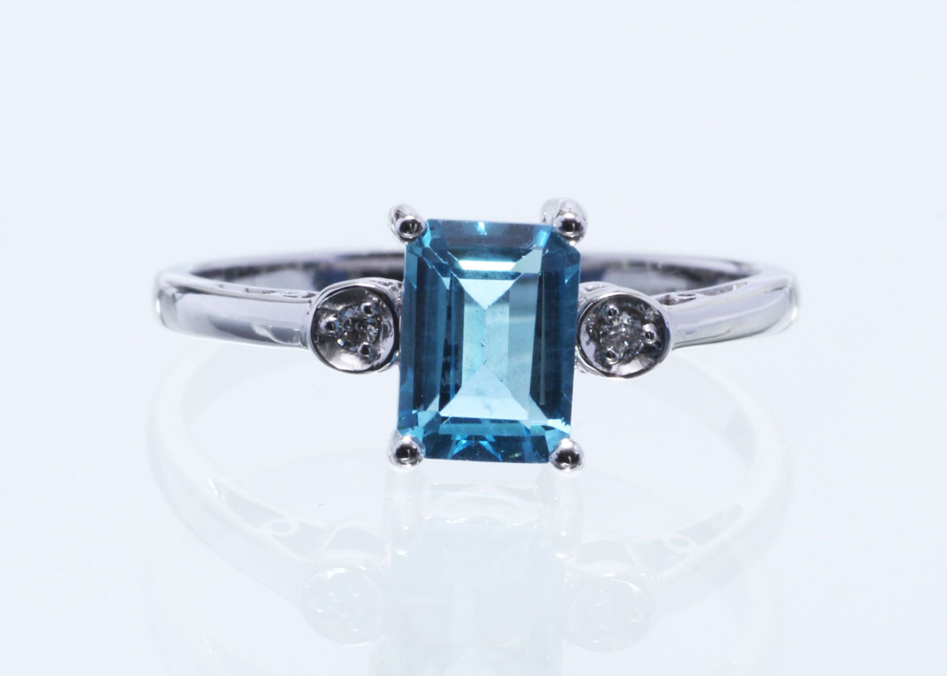 9ct White Gold Blue Topaz Diamond Ring 0.02 Carats - Valued by GIE £1,220.00 - An emerald cut Blue - Image 4 of 5