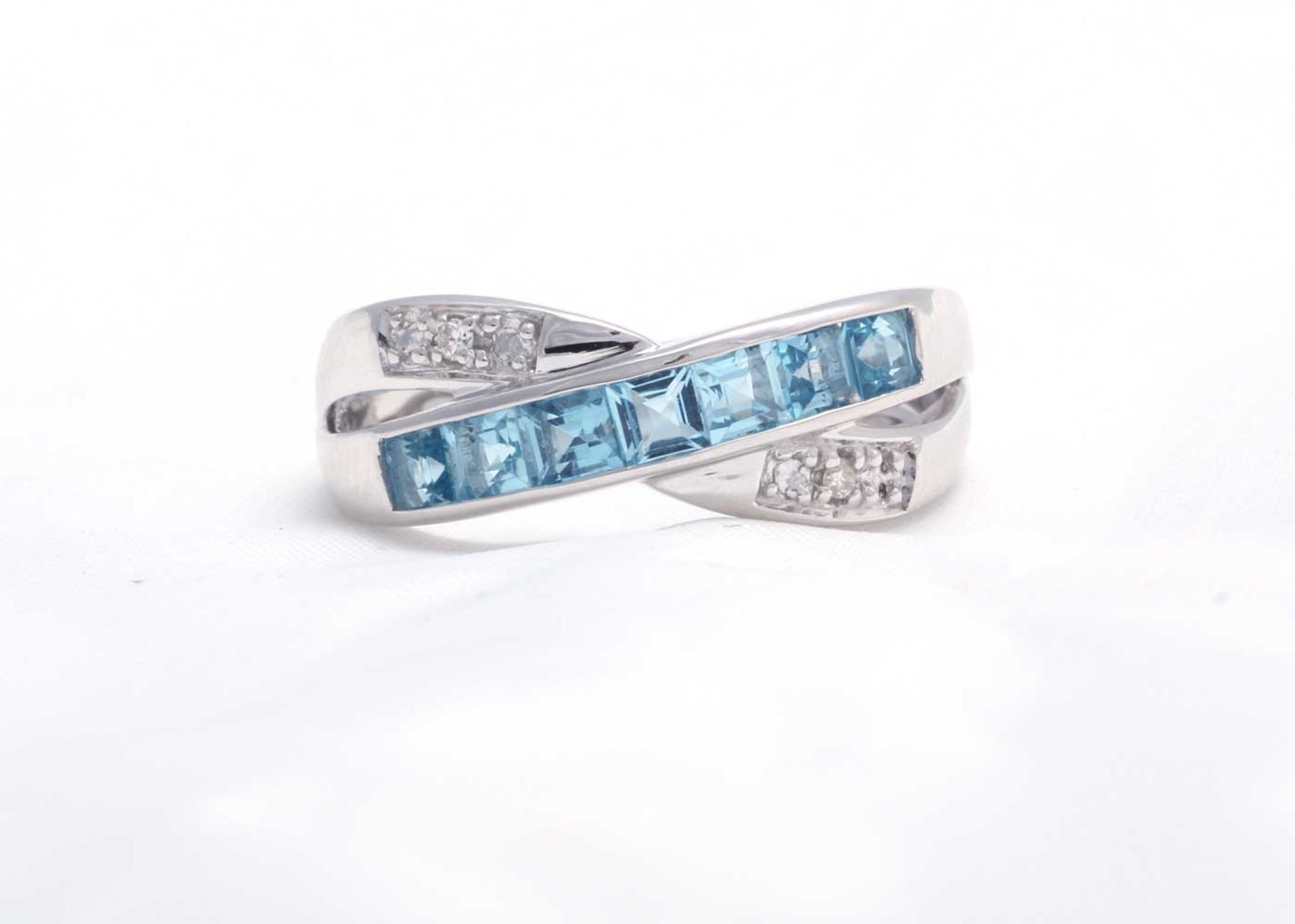 9ct White Gold Blue Topaz And Diamond Ring - Valued By GIE £1,625.00 - This twist on a classic is - Image 5 of 8