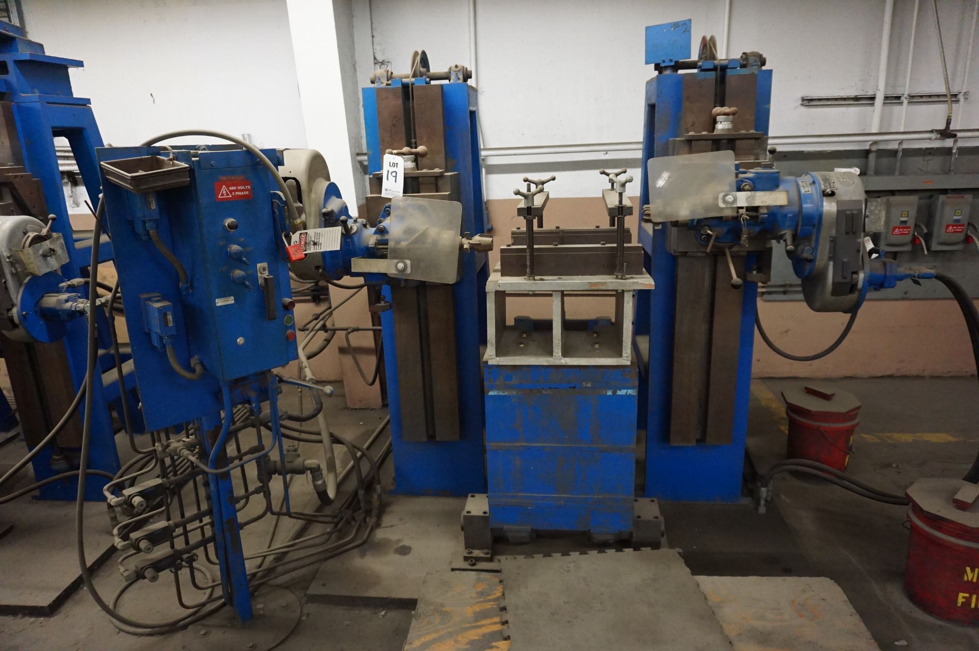 MACHINE ASSEMBLY TO INCLUDE: (2) BRIDGEPORT MILLING HEADS, PULLEY SYSTEM AND TRACKS, CONTROL, 480