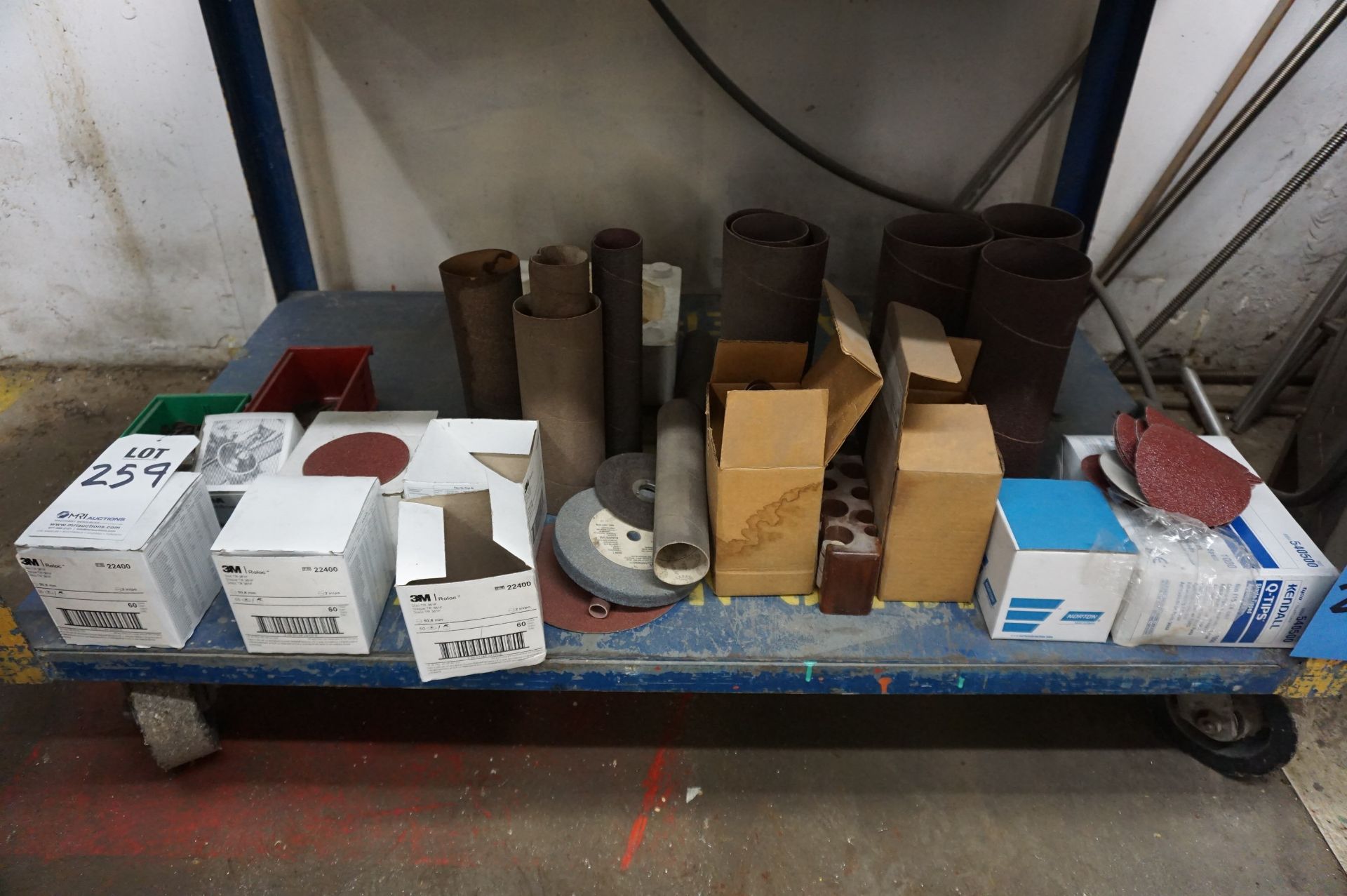 CONTENTS OF CART TO INCLUDE MISC. SANDPAPER ROLLS AND GRINDING WHEELS