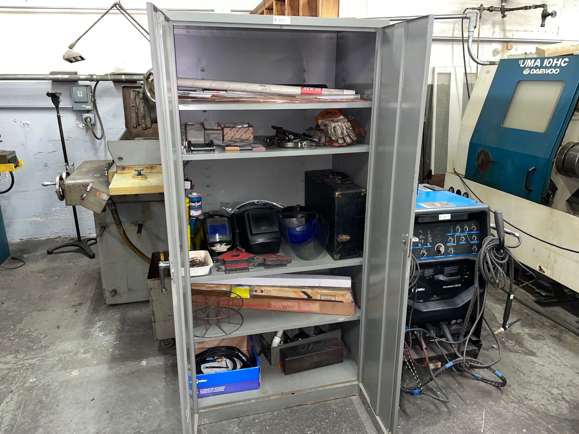 Metal 2-Door Storage Cabinet with Contens of Welding Supplies