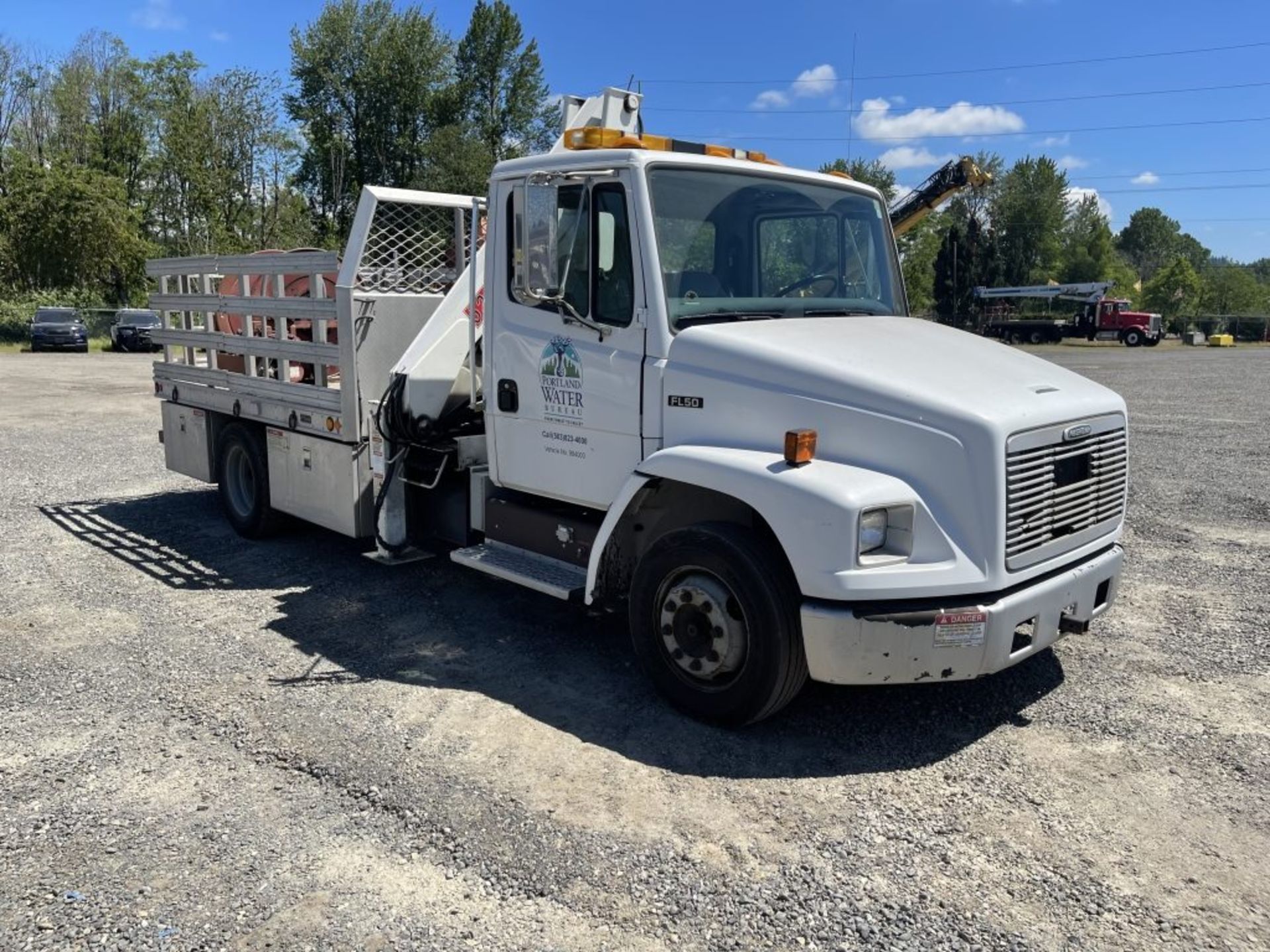 1999 Freightliner FL50 Flatbed Truck