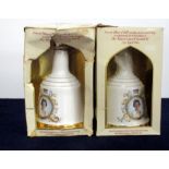 2 75-cl Bells Wade Decanters to commemorate the 60th Birthday of H. M. Queen Elizabeth II ind oc (