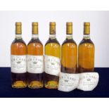 5 bts Ch. Rieussec 1986 Fargues (Sauternes) 1er Cru Classé, i.n, 1 vsl foil damage, loose labels