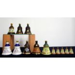 8 Assorted Bells Wade Decanters oc incl:- 1 x 12 YO, 1 x Christmas 1990, 1 x 8YO Christmas 1998, 2 x