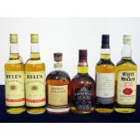 2 75-cl bts Bells Extra Special Old Scotch Whisky 40% ind oc 1 70-cl bt Chivas Regal 12 YO Blended