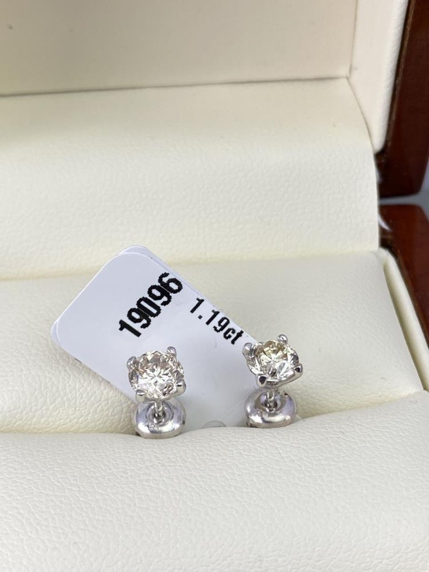 Pair of New 1.19 Carat Round Cut VVS2/D Diamond Earrings - Image 7 of 8