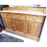 Good pine sideboard fitted with three small drawers over three cupboard doors, 136cm wide