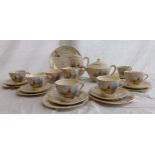 Empire England fancy tea service for six, complete, decorated with a lady in a bonnet in a garden