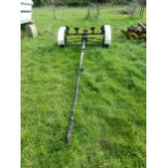 Small single axle boat trailer with rollers