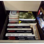 Filing cabinet filled with outboard engine manuals
