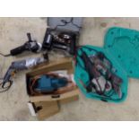 Collection of power tools - grinder, drills, allsaw and plan
