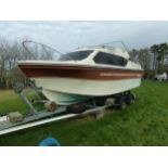 Shetland 'Four plus Two' cabin cruiser (in need of overhaul), upon a good galvanised twin axle