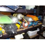 Large collection of diving equipment to include oxygen tanks, flippers, lead weighted suits etc