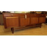 Retro 1970s teak long sideboard, with four short drawers over four cupboard doors, 195cm long