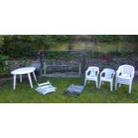 Garden swing and folding chair with further garden furniture