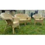 Woven cane wicker three piece conservatory suite, twin sofa and two chairs, the sofa 122cm long (3)