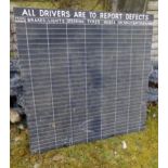 Large gridded blackboard inscribed 'All Drivers To Report Defects', grids titled: 'Truck Number', '