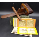 Antique wooden stereoscope with a box of cards to include landscapes, portraits, travel etc