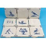 A large collection of modern delft tiles, many with painted decoration of still life, windmills and