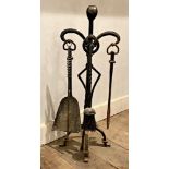 Good quality hand forged wrought iron companion set, with extra fire tools