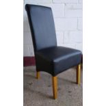 Cotswold Collection Roll back chair in matt black faux leather with oak legs