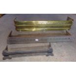 Three antique fire curbs to include a brass example (3)