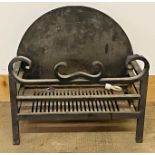 Wrought iron fire basket, with arched back and scrolled decoration, 45 high x 48 cm wide