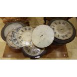Collection of military issue wall clock bits to include four cases, four dials and movement