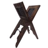 Good quality folding Quran stand, with carved pierced geometric panels and further well carved