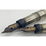 Two vintage silver Swan fountain pens each with a 14k nib (2)