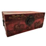 Antique Chinese lacquered pig skin casket, with applied characters and creatures, metal lock and