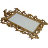 Impressive well carved Florentine mirror, with deep scrolled gilt and gesso acanthus, later