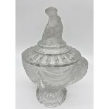 Good quality Baccarat pressed jar candy jar and cover, the lid mounted by a seated Eastern figure,