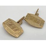 A pair of 9ct gold cufflinks by Swivlink. Weight 14.14 g approx.