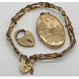 Yellow metal locket with engraved floral design 3 cm x 2 cm with a 9ct gold gate bracelet and