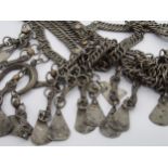 Eastern tribal white metal necklace with unusual forged links and tassels