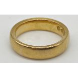 A 22 carat gold wedding band size L. Weight 8.3 g approx