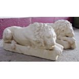 Pair of reconstituted stone Chatsworth Lions, 23 x 47cm