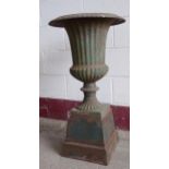 Antique cast iron urn and plinth, 90cm high
