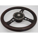 Vintage MG three spoke steering wheel, with stitched leather grip, 35cm diameter