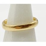 Gold wedding band, hallmarks worn and indistinct. Size K approx. Weight 4 g approx.