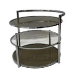 Danish chrome Space Age coffee or bedside table, of circular form with smoked glass top and