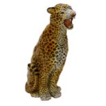 Good Italian Mid-century terracotta figure of a seated leopard, inscribed Italy to base, 84cm high