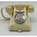An ivory bakelite telephone