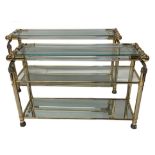 Highly decorative graduated pair of brass and Lucite console or side tables, with rope twist
