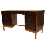 John and Sylvia Reid for Stag - walnut curved desk, with brass handles, 71cm high x 140cm wide